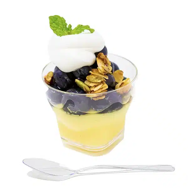 mini rum shot glass tiny plastic dessert cup with blueberry custard filling and spoon